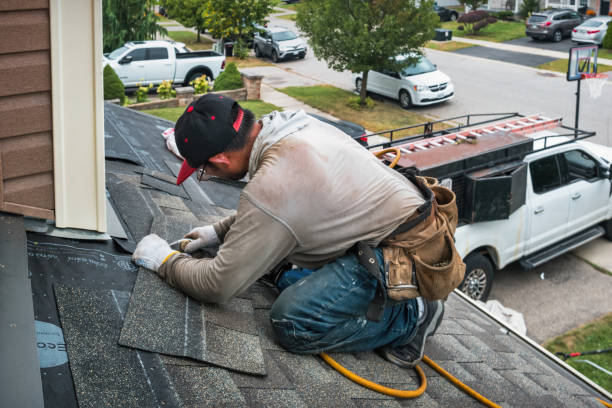 Professional Flat Roof Repair technician working in Ophir, OR